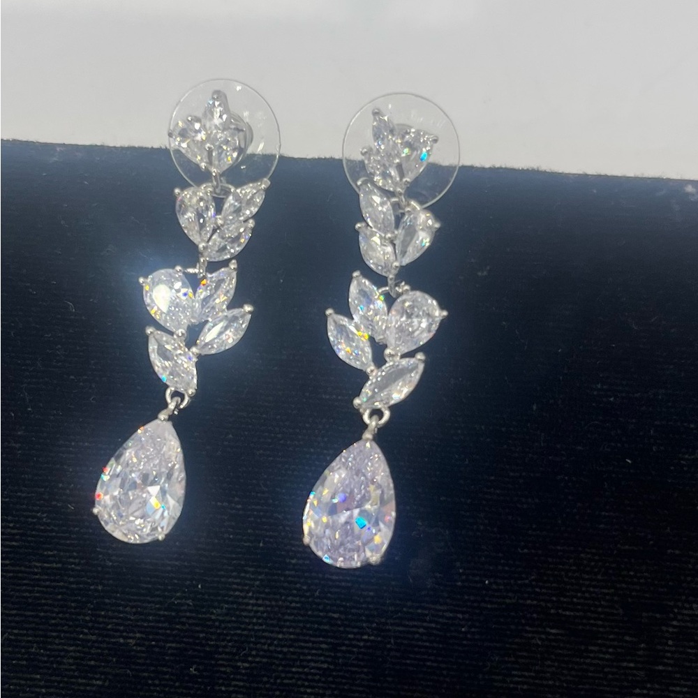 Brilliant Teardrop CZ/Crystal Dangle Pierced Earrings - Silver Tone 2” long